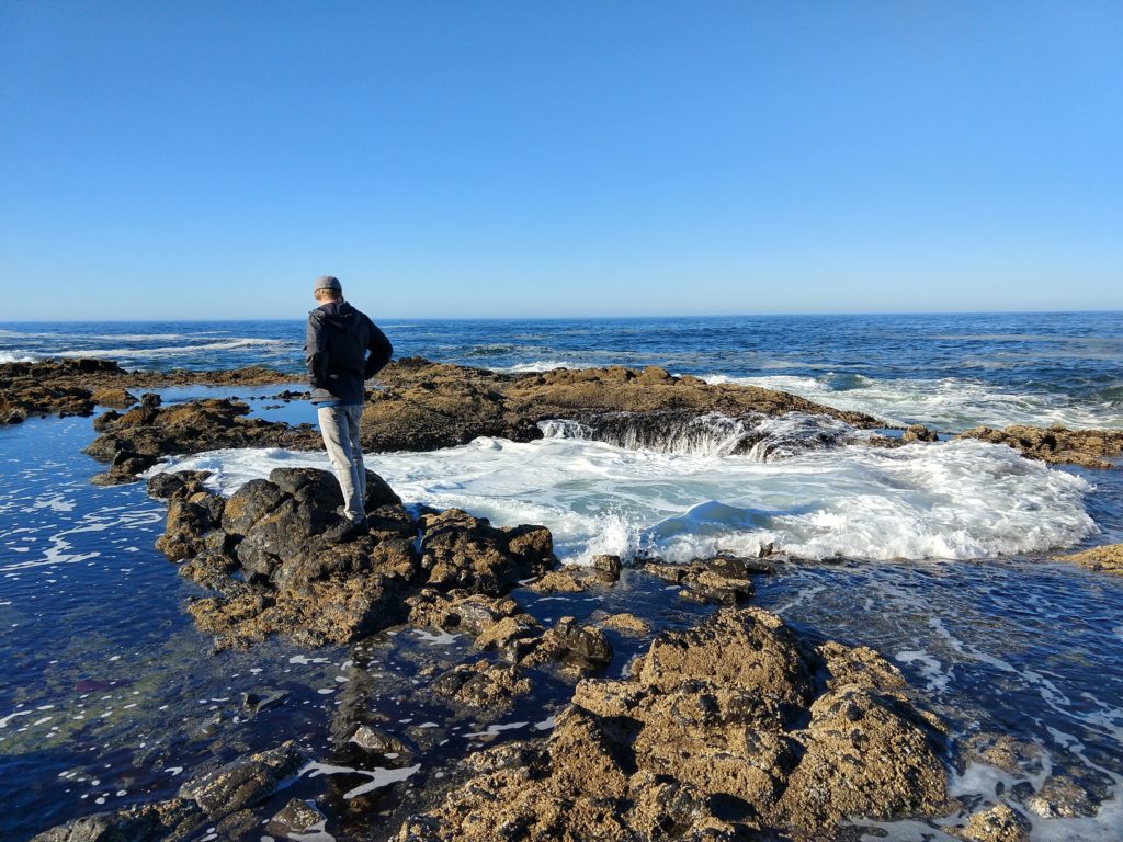 Chad looking into Thor's Well